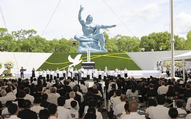A choral group of atomic-bomb survivors performs in Nagasaki's Peace Park to open a memorial ceremony on the 77th anniversary of the atomic bombing of the city. MUST CREDIT: Japan News-Yomiuri.