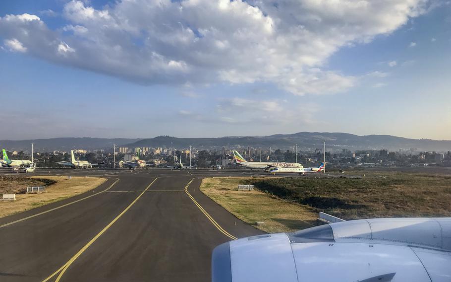 Planes sit on the tarmac at Bole International Airport in Addis Ababa, Ethiopia, on March 10, 2021. The United States Federal Aviation Administration warned pilots on Wednesday, Nov. 17, 2021 that planes operating at the airport could be “directly or indirectly exposed to ground weapons fire and/or surface-to-air fire.