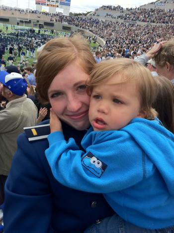 Melissa Hemphill with her son Oliver at her graduation from the Air Force Academy in 2011. To stay at school, Hemphill had to delay her senior year, terminate custody of Oliver and then regain it after graduation. Now a major in the Air Force Reserve, she has since advocated for service academies to change the policy that bans students from having children. The policy was changed in 2021. 