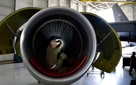 U.S. Air Force Tech. Sgt. Mike McHenry, 117th Maintenance Squadron aerospace propulsion technician, works on part of a KC-135R Stratotanker CFM56 engine on Sept. 8, 2023, at Sumpter Smith Joint National Guard Base, Alabama. This removal of the 44 fan blades from each of the jet’s four engines are replaced after every 1,500 flight hours, which is about every year and a half.  (U.S. Air National Guard photo by Staff Sgt. Shelby Thurman)