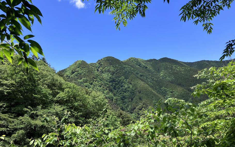 Mount Kawanori, second peak from left, rises above Hatonosu, Japan, May 28, 2024.