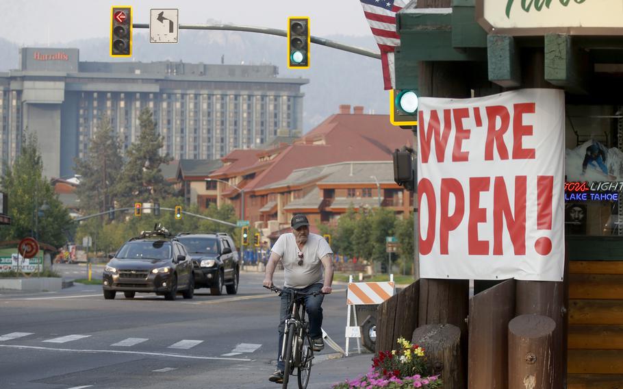 Traffic flows along Highway 50 near Stateline, Nev., as residents begin to return to South Lake Tahoe, Calif., on Sunday, Sept. 5, 2021. Cal Fire officials downgraded some evacuation orders near Lake Tahoe and allowed thousands of South Lake Tahoe residents who fled the Caldor Fire last week to return home Sunday.