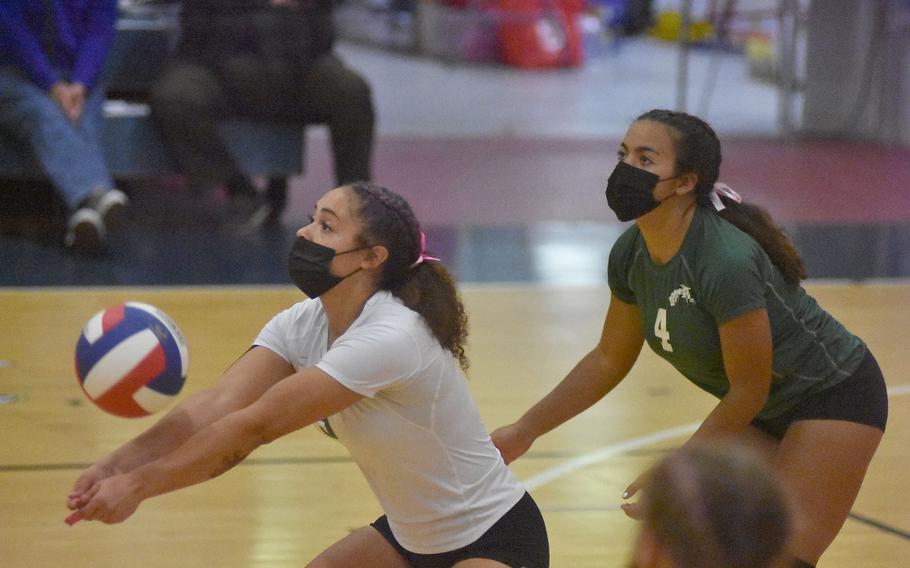 Naples libero Kennedy Rascoe bumps the ball in front of teammate Jillian Brown during the Wildcats 25-16, 25-19, 25-14 victory on Friday, Oct. 15, 2021.