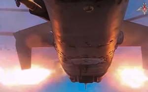 Ascreen grab from a video released on Sept. 24, 2023, shows a Ka-52 helicopter gunship of the Russian air force fires rockets at a target at an unknown location in Ukraine. 