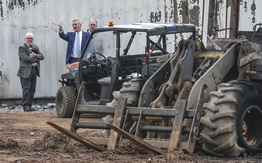 Dave Wilkinson, president and CEO of the Atlanta Police Foundation (second from left) joined Atlanta police and construction personnel to examine the site of the police training center on Monday, after violent protests on Sunday. 