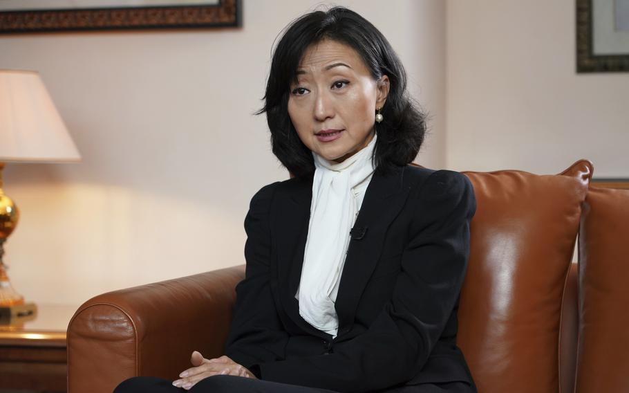 Grace Meng, the wife of former Interpol president Meng Hongwei, answers questions in Lyon, central France, Tuesday, Nov.16, 2021.