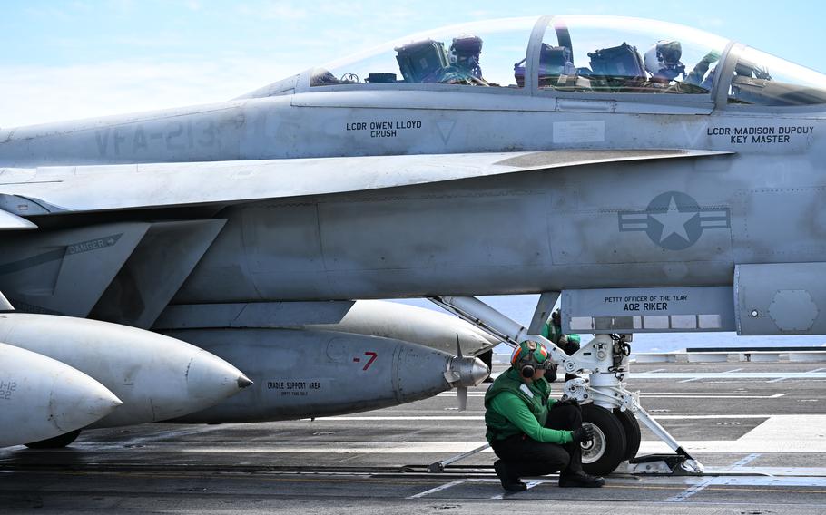 The midsection and pilot’s cockpit of a fighter jet.