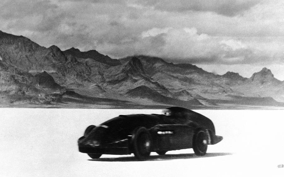 Captain George Eyston drives his Thunderbolt at the Bonneville Salt Flats, Utah on Nov. 6, 1937. The crust keeps tires cool at high speeds and provides an ideal surface for racing — unless seasonal flooding fails to recede or leaves behind an unstable layer of salt. 