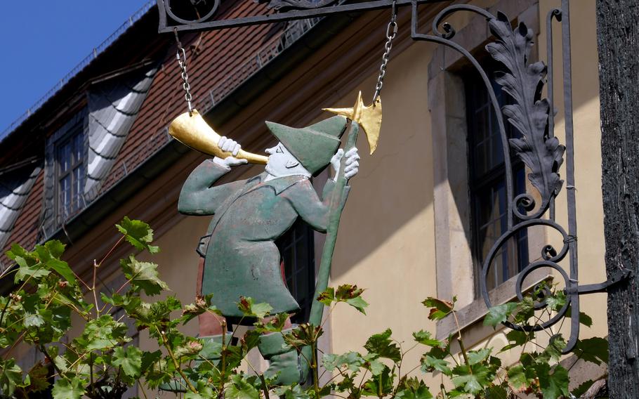 An old-fashioned sign hangs outside the Stadtwaechter, a tavern in Fulda’s old town.