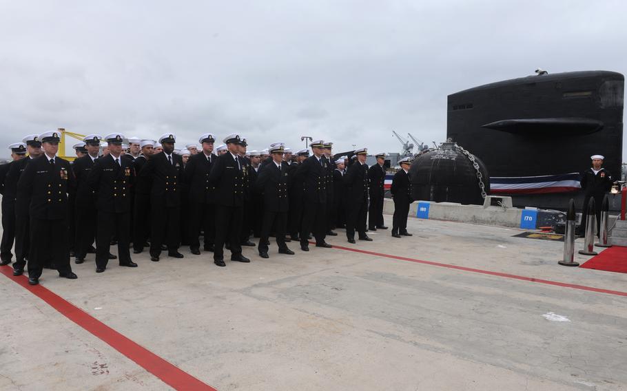 The crew of the Los Angeles-class fast-attack submarine USS Albuquerque (SSN 706) stands at parade rest during the boat’s inactivation ceremony celebrating more than 32 years of Naval service.