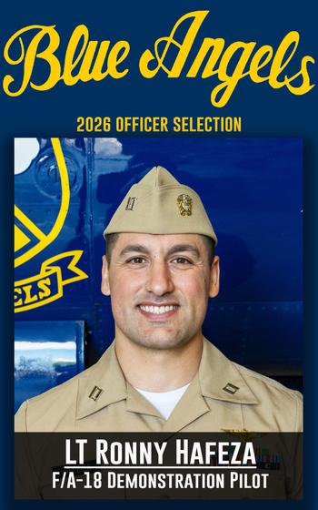 A service member smiles for a photo