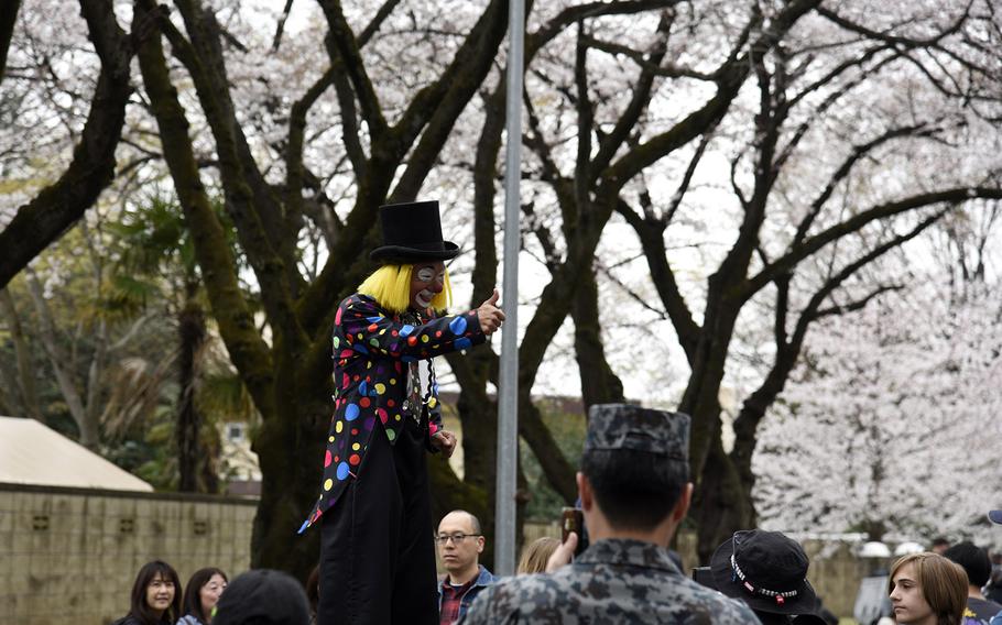 A street performer entertains the crowd during the Sakura Spring Festival at Yokota Air Base, Saturday, April 6, 2024.