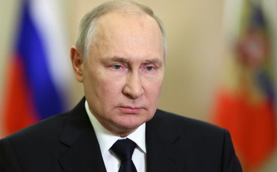 Russian President Vladimir Putin speaks during a video celebrating the anniversary of the referendum called illegal by the U.N. in four Ukrainian regions one year ago,  in Moscow, Russia, Saturday, Sept. 30, 2023. (Mikhail Metzel, Sputnik, Kremlin Pool Photo via AP)