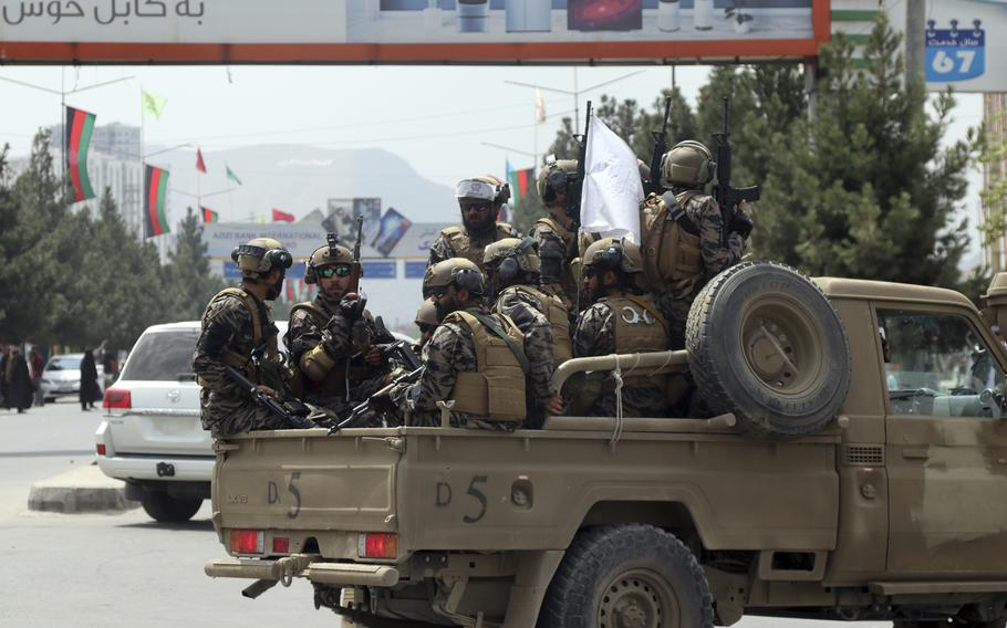 Taliban special force fighters arrive inside the Hamid Karzai International Airport after the U.S. military’s withdrawal, in Kabul, Afghanistan, Tuesday, Aug. 31, 2021.  The Taliban released a U.S. Navy reservist and his brother on Friday.