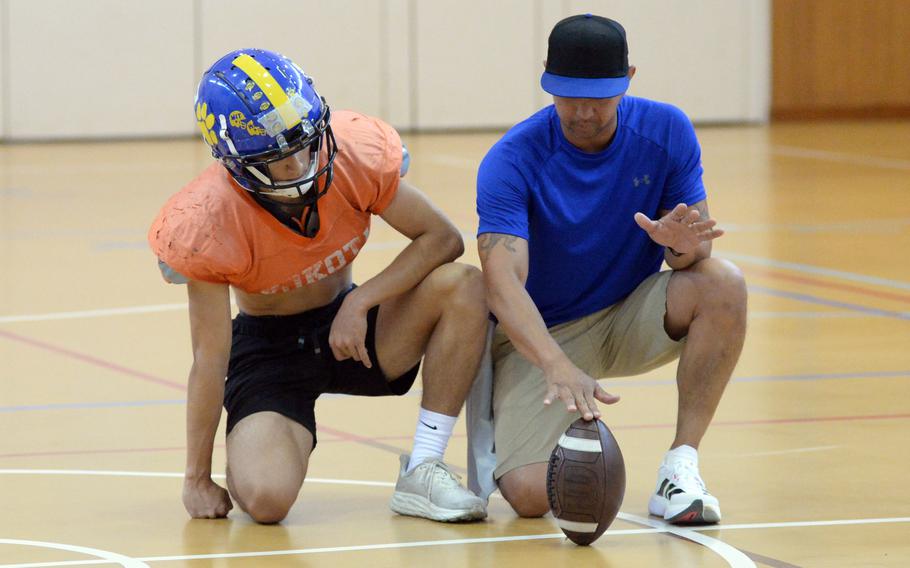 Jay Dayao and Julian Chuckrey discuss placing the ball for extra-point kicks.