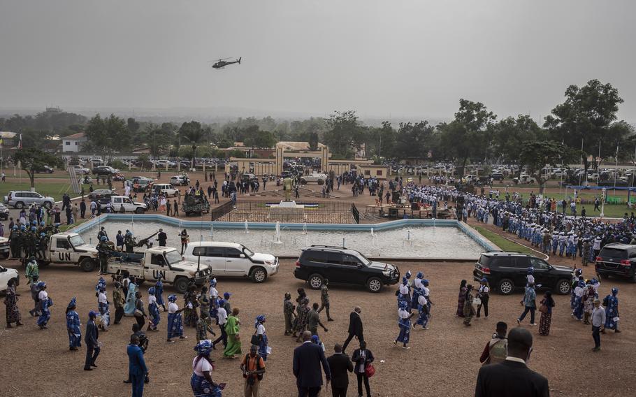 Guests leave the national assembly building following Central African Republic President Faustin-Archange Touadera's inaugural ceremony in Bangui on March 30, 2021. Touadera was sworn in for a second term amid mounting threats to his presidency.