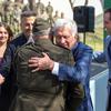 Maj. Gen. Charles Lombardo, commander of the 2nd Infantry Division, hugs Thomas Lombardo III, son of 1st. Lt. Thomas Lombardo, after the redidication ceremony for Lombardo Field at Camp Casey, South Korea, April 8, 2025. 