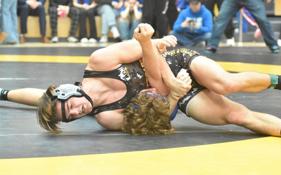 Stuttgart’s Jace Holmes appears to have Ramstein’s Lucas Hollenbeck headed for a pin in a 165-pound semifinal match Saturday, Feb. 10, 2024, at the DODEA European Wrestling Championships. But Hollenbeck got away and Holmes got injured and the Royals had another wrestler reach the final round.