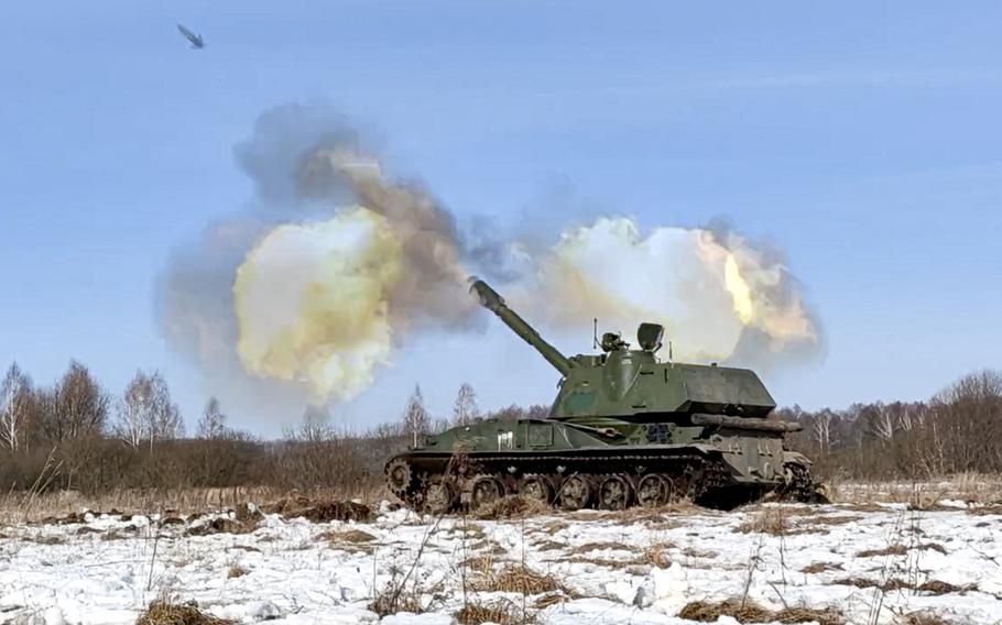 In this photo taken from video provided by the Russian Defense Ministry Press Service on Tuesday, Feb. 15, 2022, a self-propelled artillery mount fires at the Osipovichi training ground during the Union Courage-2022 Russia-Belarus military drills in Belarus. 