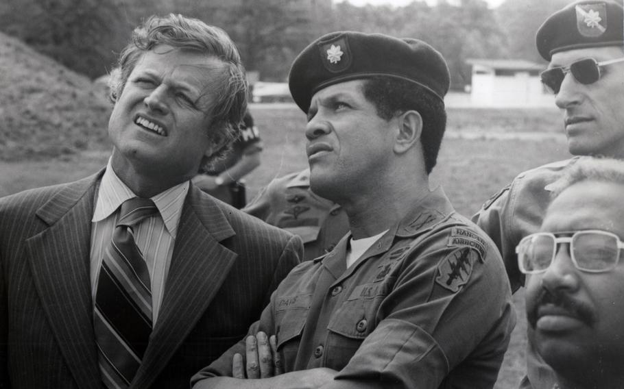Sen. Ted Kennedy, D-Mass., had a discussion with then-Maj. Paris Davis during a visit to Vietnam in late 1960s.