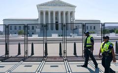 Security works outside of the Supreme Court, Thursday, June 30, 2022, in Washington. 