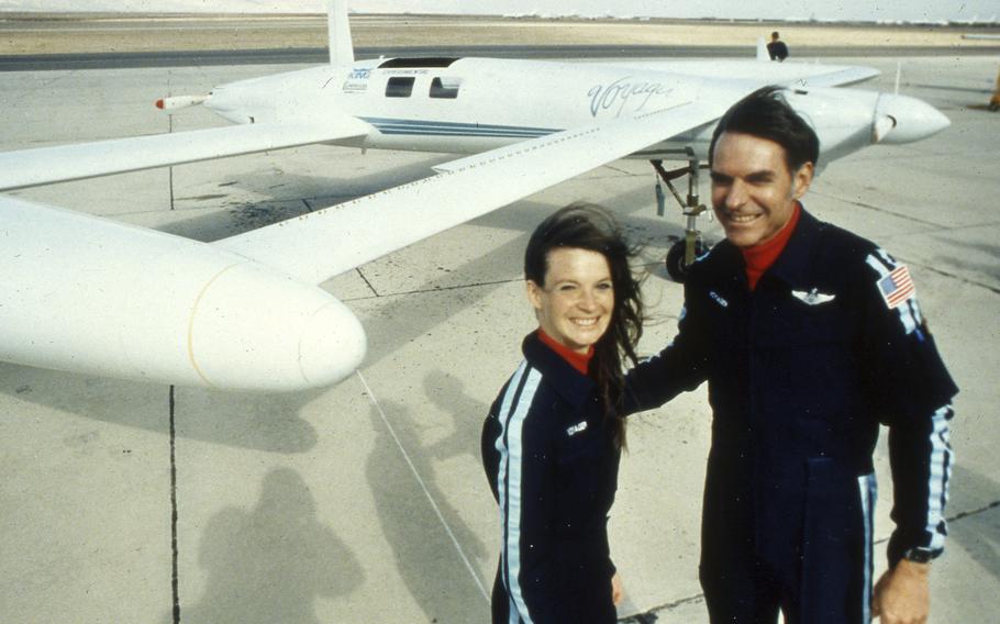 Co-pilots Dick Rutan, right, and Jeana Yeager, no relationship to test pilot Chuck Yeager, pose for a photo after a test flight over the Mojave Desert, Dec. 19, 1985. Rutan died late Friday, May 3, 2024. He was 85.
