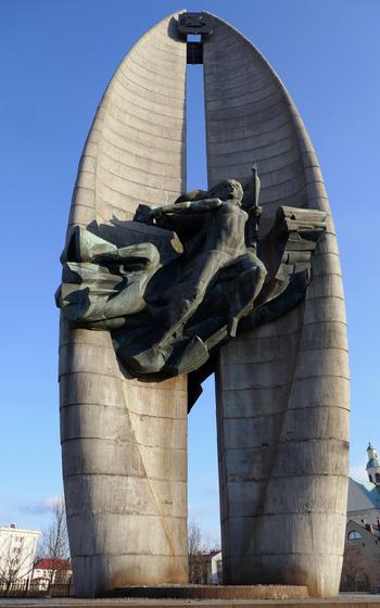 The Monument to the Revolutionary Action in Rzeszow, Poland. Also called the Monument to the Revolutionary Struggle, it was designed by Marian Konieczny and erected in 1974 as a communist monument to World War II fighting in the area. Seen here is Nike, the goddess of victory. On the other side is a sculpture of a soldier,  a worker and a peasant. 