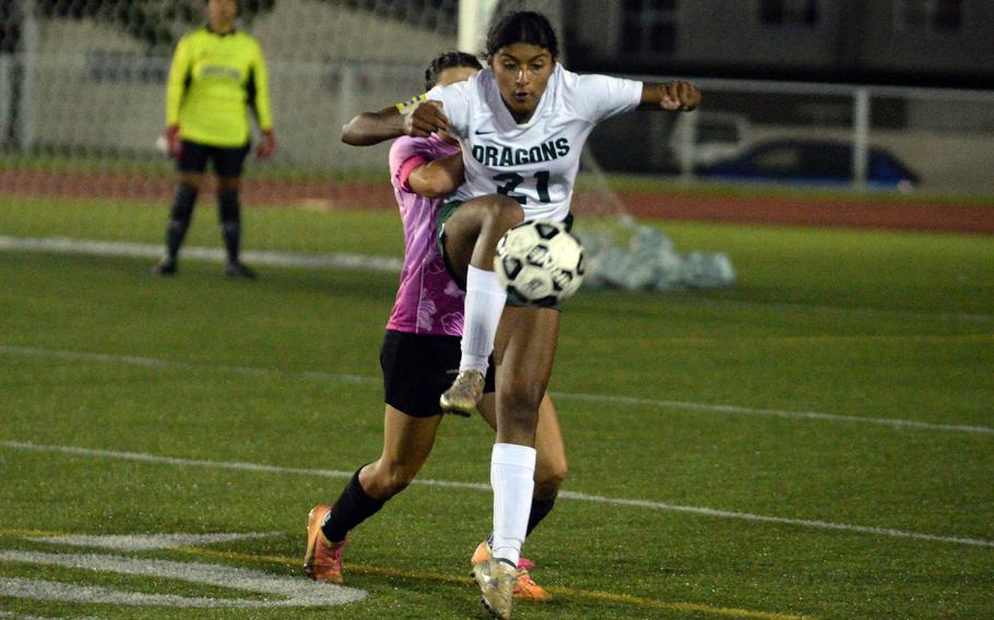 Solares Solano tries to settle the ball.