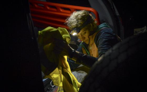 Jagoda Pasko, a volunteer from Poland who delivers humanitarian aid to civilians trapped in the battlefields of Ukraine, packs medical equipment into a rugged vehicle as part of a plan to drive across the Polish border. While delivering aid to Ukrainian civilians, she picked up two victims of shelling who died in her vehicle as she rushed to a hospital, Pasko said in Warsaw, Poland on Nov. 4, 2022, adding she vows to have enough medical gear to ensure no one dies on her watch again.