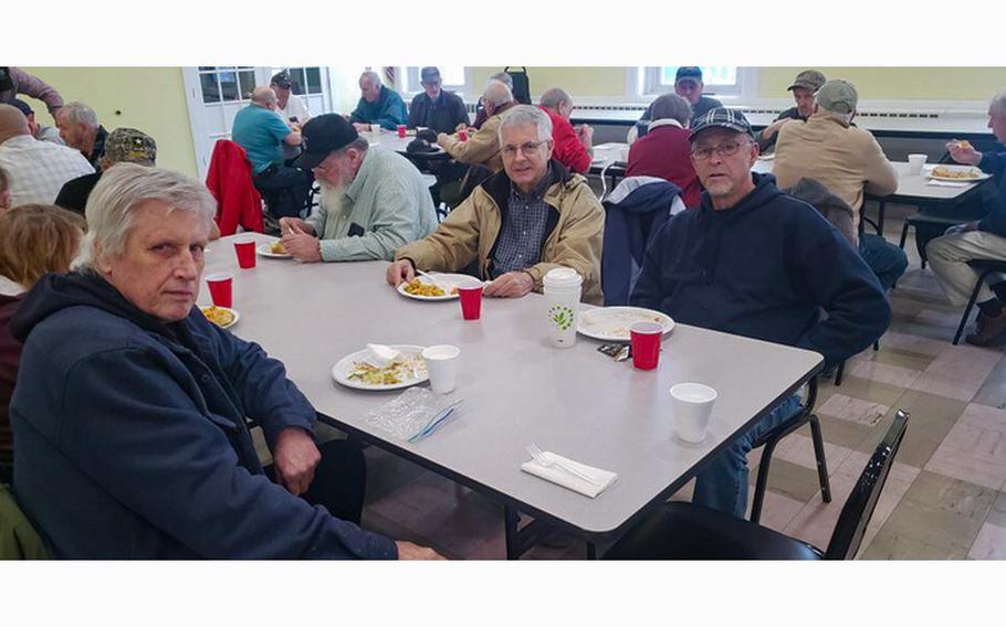 From left, veterans Richard Norman, Jerry Labrie and Domenico Fratamico enjoy each other’s company at the monthly veterans luncheon at Easthampton Congregational Church.