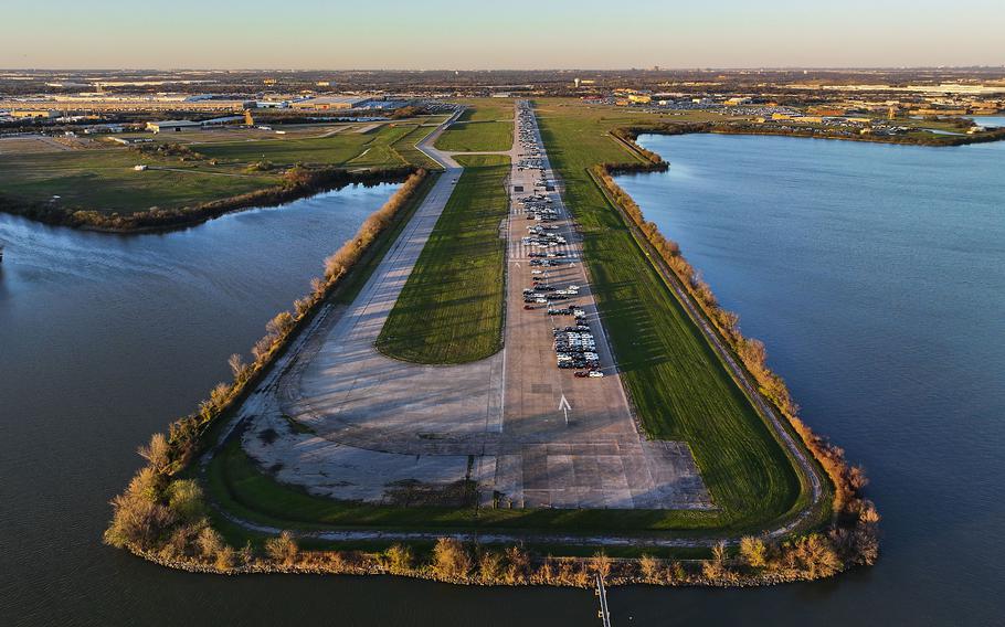 Automobiles fill a former runway at Dallas' Hensley Field in December 2022.