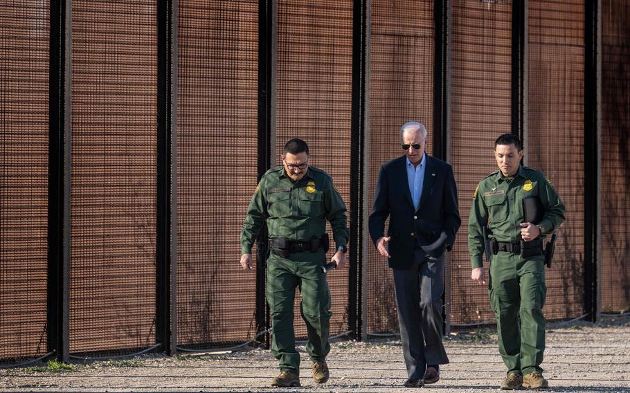 President Joe Biden speaks with U.S. Customs and Border Protection officers as he visits the U.S.-Mexico border in El Paso, Texas, on Jan. 8, 2023. 