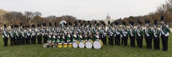 The Lewisburg (Pa.) Area High School marching band lines up for a photo on the National Mall before the National Veterans Day Parade on Sunday, Nov. 12, 2023, in Washington. 