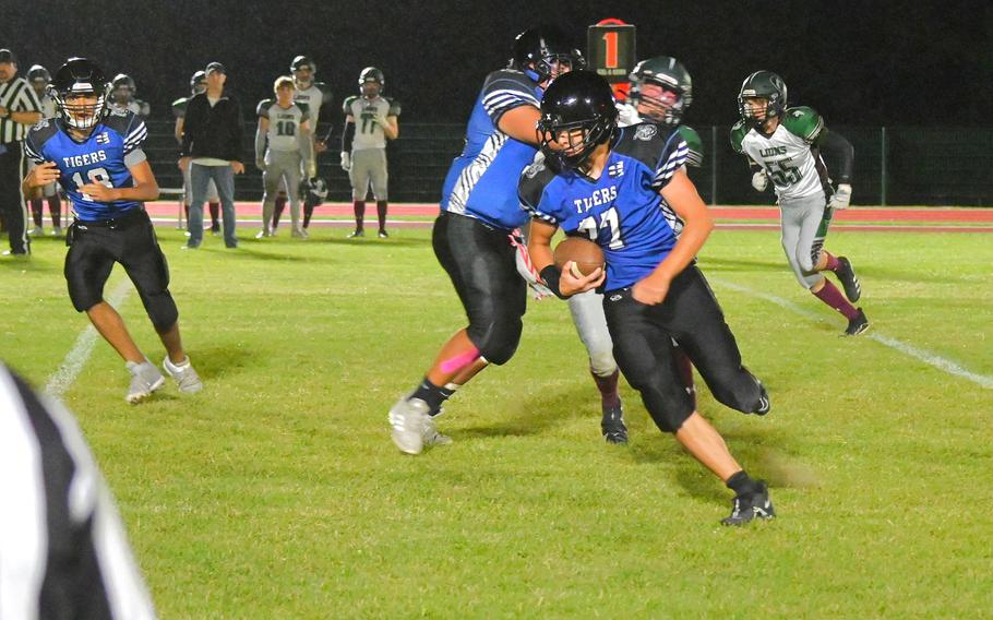 Julian Yazzie puts together a short run after the catch for Hohenfels during a football game against the AFNORTH Lions on Sept. 29, 2023 at Hohenfels Middle High School.