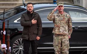 Gen. Christopher Cavoli, NATO’s supreme allied commander and head of U.S. European Command, is flanked by Ukrainian President Volodymyr Zelenskyy at a meeting in Wiesbaden, Germany, on Dec. 14, 2023. Cavoli said May 16, 2024, that Russia's military lacks enough troops for a major breakthrough in Ukraine, despite recent battlefield gains.