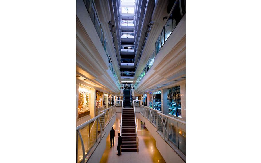 A gleaming mall in downtown Kabul offers shoppers everything from designer clothes to laptops. The mall stands in stark contrast to other areas of Kabul — and Afghanistan as a whole.