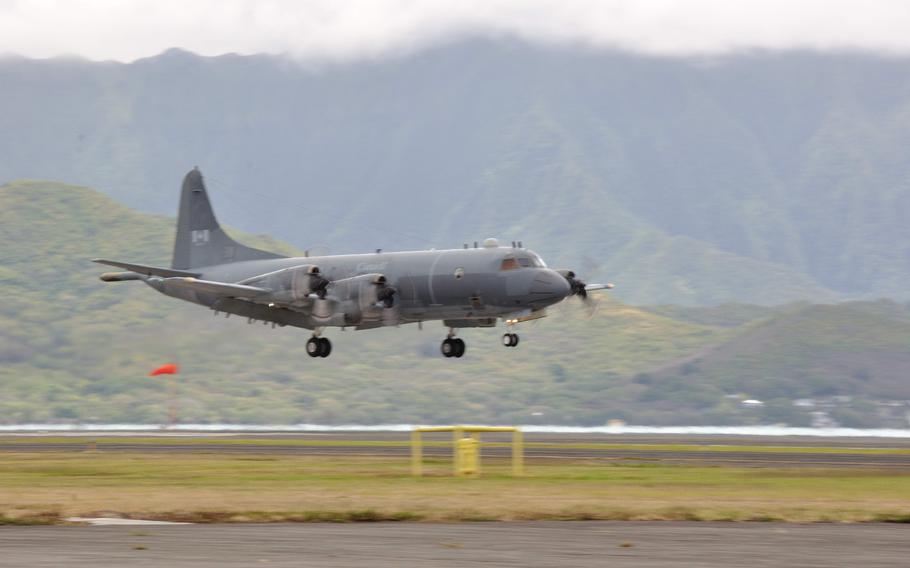 A Royal Canadian Air Force CP-140 Aurora arrives at Marine Corps Base Hawaii, Kaneohe Bay, Hawaii, in July 2022 for Rim of the Pacific (RIMPAC) 2022. 