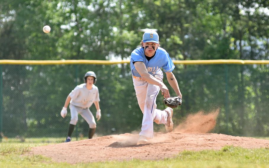 Sigonella pitcher C.J. Davis tosses the ball during the Division II/III DODEA European baseball championship game against Naples on May 20, 2023, at Southside Fitness Center on Ramstein Air Base, Germany.