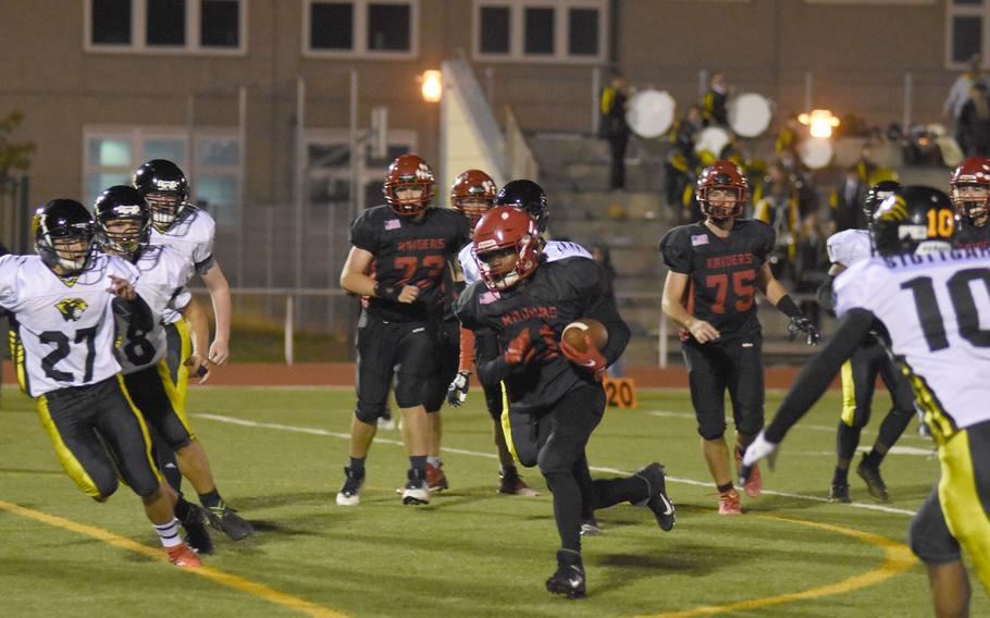 Kaiserslautern’s Brelan Barnes finds some running room late in the game Friday, Sept, 30, 2022,  in Division I DODEA-Europe football action against Stuttgart.