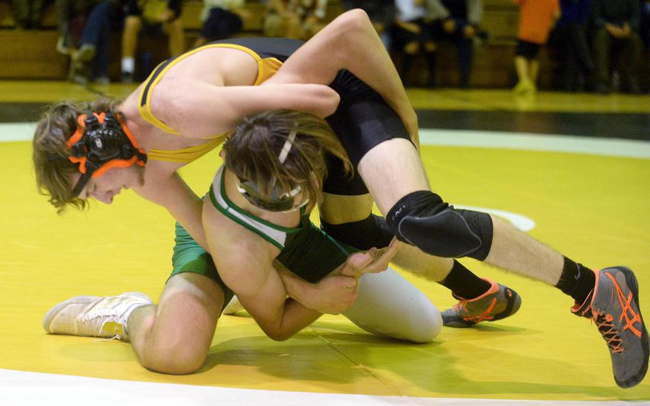 Kadena's Kurt Chapman gains the upper hand on Kubasaki's Adrian Misenhimer at 168 pounds during Wednesday's Okinawa wrestling dual meet. Chapman, the reigning 129-pound Far East champion from two years ago, pinned Misenhimer in 2 minutes, 12 seconds.