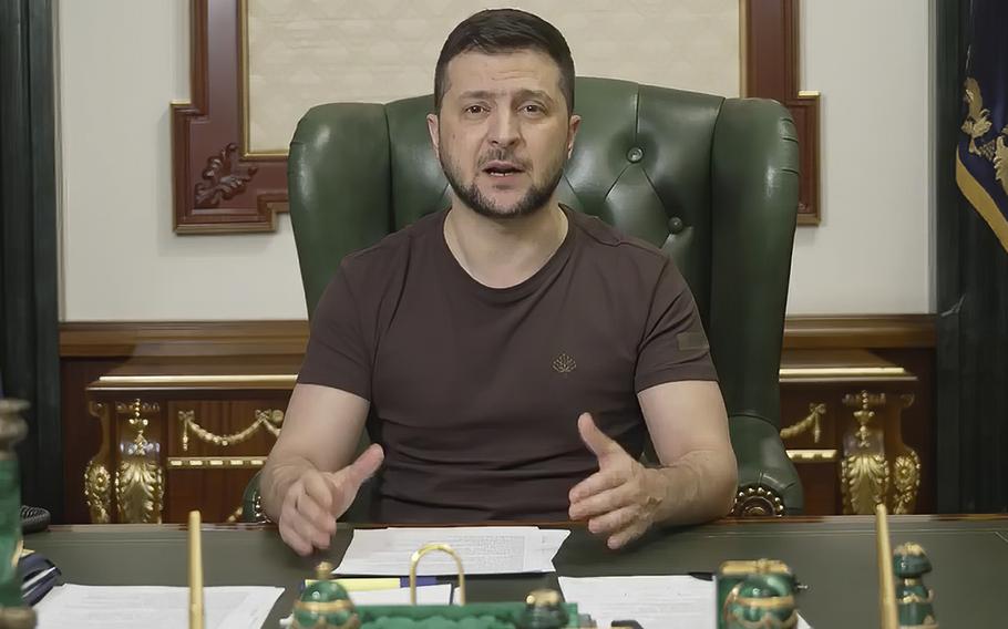 In this image from video provided by the Ukrainian Presidential Press Office, Ukrainian President Volodymyr Zelenskyy speaks from Kyiv, Ukraine, early Sunday, March 20, 2022.