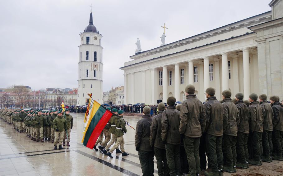Lithuanian military cadets take the oath of service during a ceremony in Vilnius, Lithuania, on Nov. 15, 2023.