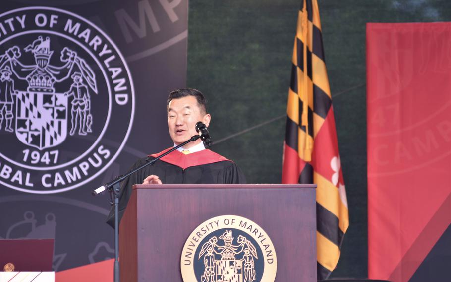 Tony Cho, vice president and director of University of Maryland Global Campus Europe, speaks to graduates at the program’s commencement ceremony for the class of 2022 on Saturday, April 30, 2022.