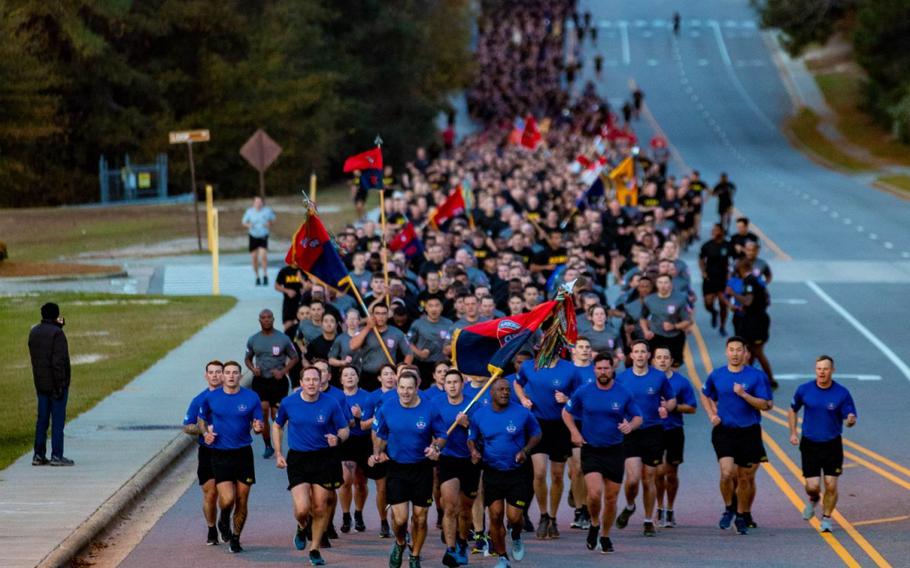 Paratroopers participate in a division run along Long Street during the All American Run on Fort Bragg, N.C., Nov 19, 2021. According to reports on Wednesday, Jan. 12, 2022, the Army is offering a maximum enlistment bonus of $50,000 to highly skilled recruits. Vincent Levelev/U.S. Army