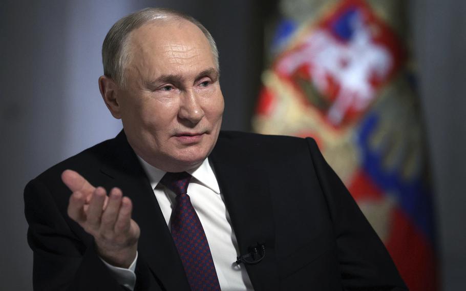 Russian President Vladimir Putin speaks during an interview with Rossiya Segodnya International Media Group Director General Dmitry Kiselev, in Moscow, Russia, Tuesday, March 12, 2024.