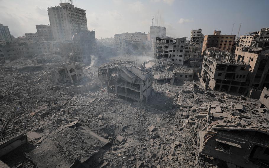 Buildings in the Gaza City neighborhood of al-Rimal lie in ruins on Oct. 10, 2023.