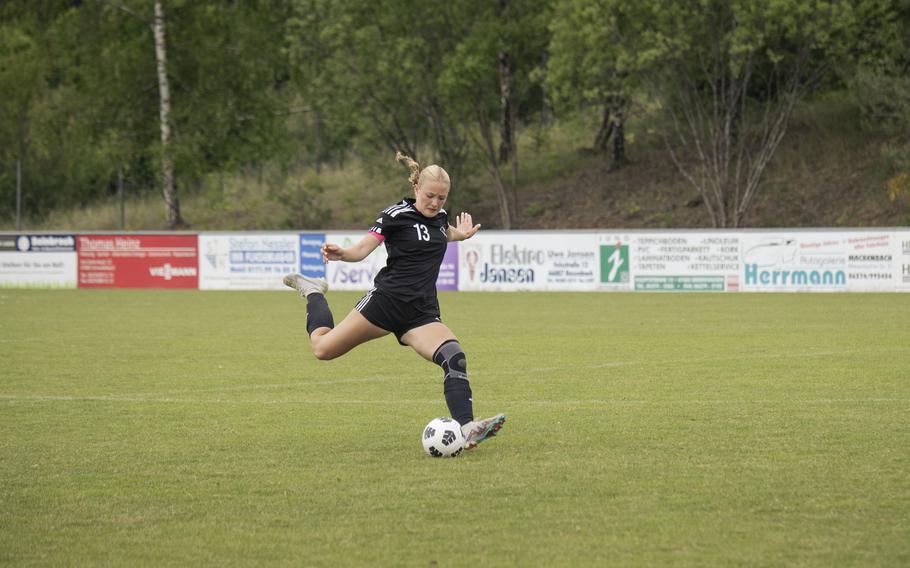 Avonlea Sparling, a senior with the Vicenza Cougars takes a free kick during a match against the Black Forest Academy Falcons in the semifinals of the 2025 Division II DODEA European championships at Reichenbach-Steegen, Germany on May 21, 2025.