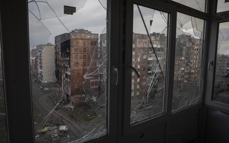 Destruction in Bakhmut seen through broken windows. 