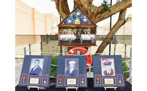 A memorial honors the sacrifices of Coast Guard Petty Officer 3rd Class Nathan Bruckenthal, Navy Petty Officer 1st Class Michael Pernaselli and Navy Petty Officer 2nd Class Christopher Watts, service members from the USS Firebolt, who were killed in a 2004 attack.