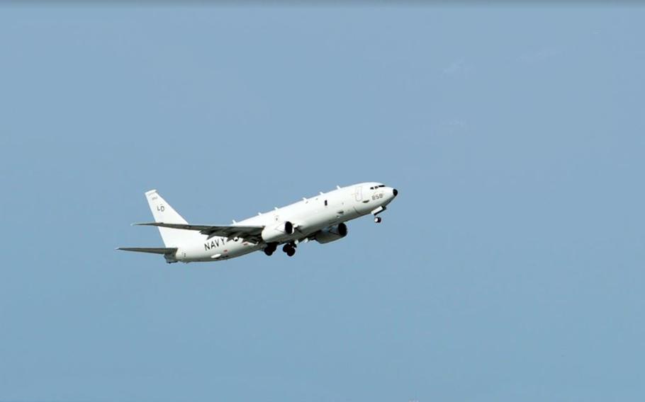 A U.S. Navy P-8A Poseidon takes off from Kadena Air Base, Okinawa, March 3, 2023.